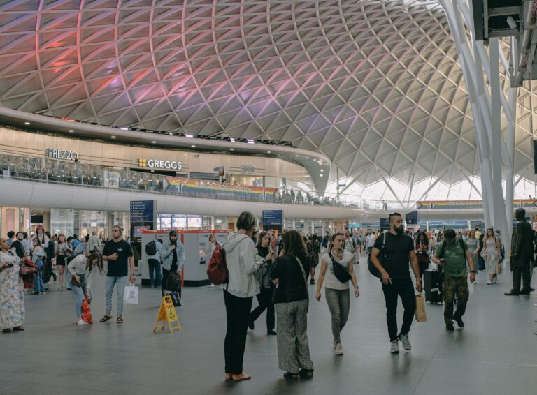 Situational awareness in a busy London railway station, with passengers moving through King's Cross concourse.